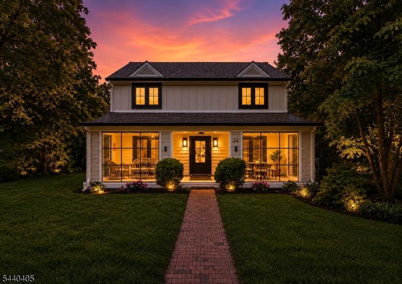 Experience the perfect blend of timeless architecture and sophisticated modern craftsmanship in this exceptional, newly rebuilt 6-bedroom, 5.1-bath home in the highly desirable Glenwood section of Short Hills. Thoughtfully designed with impeccable attention to detail, the residence showcases elevated finishes, custom millwork, and a warm contemporary aesthetic throughout. The stunning chef's kitchen features custom cabinetry, an oversized center island, premium Dekton stone surfaces, designer appliances, and a fully equipped walk-in pantry, seamlessly flowing into sun-filled living and entertaining spaces. Every bathroom has been thoughtfully curated with Porcelanosa tile, custom vanities, and premium fixtures. A first-floor guest suite offers flexible living options, while the finished lower level includes an additional bedroom suite and a recreation room. The luxurious primary suite serves as a private retreat, complete with heated Porcelanosa floors, premium Brizo fixtures, a freestanding Victoria + Albert soaking tub, an oversized shower, and a custom double vanity. Exterior highlights include board-and-batten detailing, black-framed windows, a welcoming front porch enhanced with custom glass enclosure panels, and professionally designed landscaping. Ideally located near top-rated schools and just steps from the Short Hills train station, this rare offering combines exceptional design, luxury finishes, and modern living in one of the most sought-after locations.