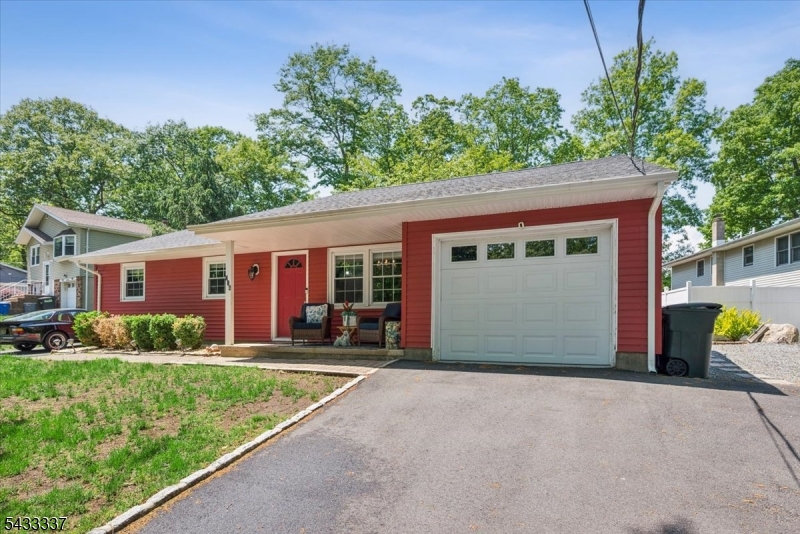 Welcome home to this beautifully updated 3-bedroom ranch in the heart of Hopatcong! This move-in ready home features 1 1/2 bathrooms and a thoughtfully updated kitchen complete with stainless steel appliances including a refrigerator, gas stove, warming drawer, and dishwasher. The room also features a breakfast bar, plenty of cabinets and a stunning backsplash.Enjoy entertaining in the large dining room with premiun Anderson sliders leading to a custom patio and open backyard space featuring a large grassy area, and newer shed. The home showcases updated finishes and custom materials throughout, offering style and comfort in every room.Additional highlights include a 1 car garage, 2 driveways providing ample parking, and a generator hookup for added convenience and peace of mind. Conveniently located close to the center of town near shopping, restuarants, and salons, this home truly has nothing for you to do but move in!
