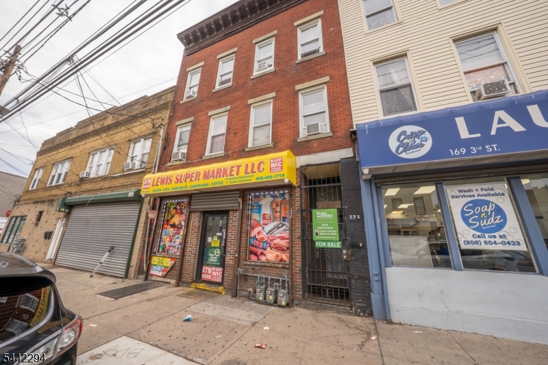 Great Investment Opportunity!Start generating income immediately with this fully rented mixed-use property featuring two spacious 3-bedroom apartments and a commercial bodega storefront. All units are currently occupied, providing immediate cash flow and strong investment potential. An excellent opportunity for investors seeking a turnkey, income-producing property with established tenants. Near major highways, Jersey Gardens Outlets & EWR Int'l Airport.