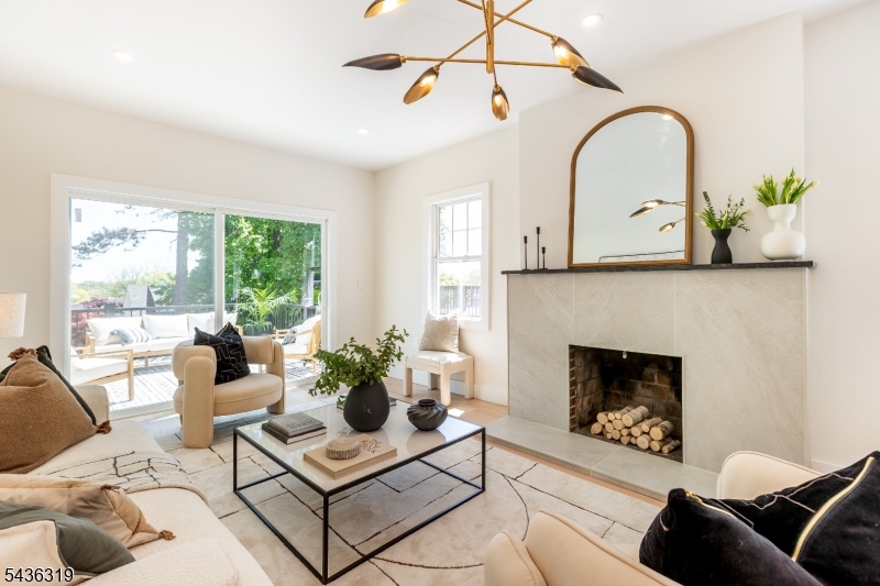 Keep the city energy, just add breathing room.Filled with natural light and thoughtfully redesigned throughout, 4 Yale Terrace combines sophisticated finishes, exceptional outdoor living, and a prime location in the Gregory neighborhood. Multiple spaces for gathering - from the welcoming front porch to the elevated deck, lower patio, and oversized backyard - create a home equally suited for entertaining, relaxation, and everyday living.This professionally redesigned home has been extensively rebuilt with all major systems replaced, including a new roof, making it truly move-in ready. Inside, curated materials and thoughtful design choices deliver a level of sophistication rarely found in comparable renovations. At the heart of the home, a beautifully designed kitchen combines refined materials and warm finishes, curated lighting, sleek surfaces, and thoughtful craftsmanship, creating a stunning yet welcoming space that naturally draws people in and invites them to linger.The primary suite features a spa-inspired bath, while a spacious, sun-filled 3rd-floor bedroom offers flexibility as a home office, studio, or future en-suite, delivering the comfort and privacy of a retreat within the home. Located near parks, dining, shopping, and NYC transportation, 4 Yale Terrace offers the rare mixture of thoughtful design, natural light, exceptional outdoor living, and a design sensibility that transforms a meticulously redesigned house into a place that truly feels like home.