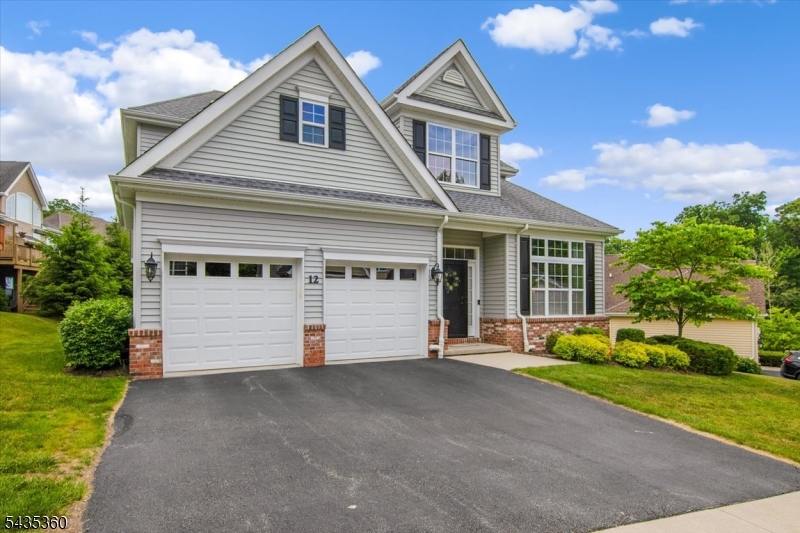 Welcome to a true GEM! Beautifully maintained Operetta model in highly sought-after Nolans Ridge - one of Morris County's premier active adult communities. Offering the perfect blend of comfort, elegance & low-maintenance living, this spacious 3-bedroom home has been thoughtfully updated & meticulously cared for! The open-concept floor plan features soaring ceilings & a seamless flow between the kitchen & great room, creating an inviting space for both everyday living & entertaining. The well-appointed kitchen offers granite countertops, stainless steel appliances, abundant cabinetry & overlooks the sun-filled great room with a cozy gas fireplace. The spacious primary suite serves as a private retreat, highlighted by a beautifully RENOVATED BATHROOM & an expanded walk-in closet complete w/custom organizers. 2 additional bedrooms provide flexibility for guests, office space, or hobbies. Recent improvements & upgrades include a newer expanded TREX DECK, ideal for outdoor relaxation & entertaining, custom window treatments throughout, a WHOLE HOUSE GENERATOR for added peace of mind & DUAL HVAC systems for enhanced comfort & efficiency. Additional storage room provides valuable extra space. Enjoy the exceptional lifestyle that Nolans Ridge is known for, w/outstanding amenities, social activities & a convenient location close to shopping, dining, healthcare & major transportation routes. TRUE MAINTENANCE FREE LIVING! Security System may be available to be transferred if desired.