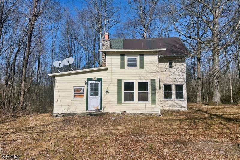 Incredible opportunity and location. Adjacent to Greenwood Lake where fishing, boating, hiking, and swimming abound. .5 mile form the park and ride, and seconds from Browns Point.  Just mere minutes from numerous parks like Sterling Forest, Wawaynada State Park, Ringwood State Prak, and the Appalachian trail. Skiing at Mount Peter is less than 20 minutes away.  A dream lot at well over half an acre and wooded with plenty of trees. So many ways to make this home your own, remodel or create a dream vacation home. Being sold as-is. Buyer responsible for all inspections and/or any municipal certifications needed for sale. Buyer responsible for well water test. No repairs will be done by seller. Cash or renovation loans only.