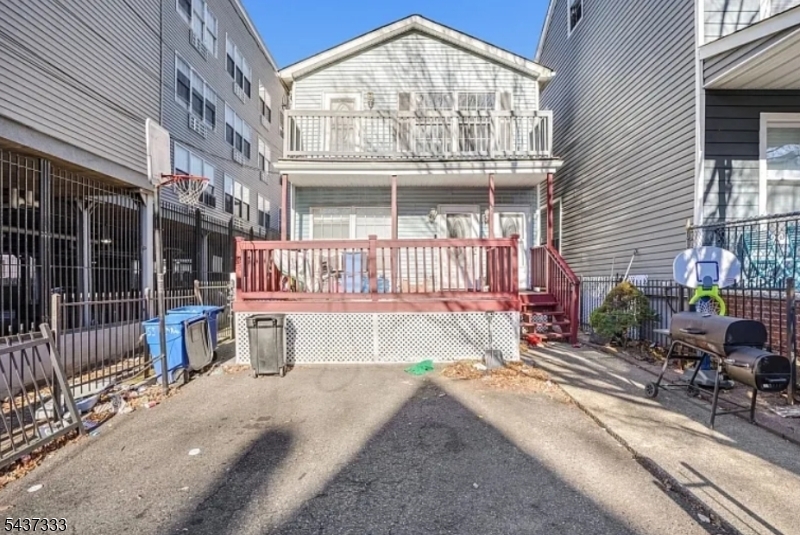 Excellent opportunity to own this two-family home in a convenient Paterson location. 2nd floor Unit was fully renovated about a year ago and 1st floor unit is in good well maintain condition. Each unit features 3 spacious bedrooms and 2 full bathrooms, offering comfortable living space for both owner-occupants and investors. Separate living and dining areas provide plenty of room for everyday living and entertaining. The property includes a private driveway with 2 exclusive parking spaces, providing added convenience for residents. Conveniently located near schools, shopping, public transportation, major highways, parks, and local amenities. Don't miss this opportunity to own a versatile investment property in a desirable area.