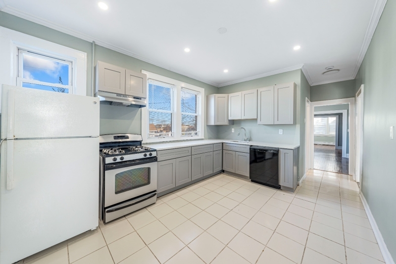 This spacious rental is conveniently located in the heart of Linden and situated on a corner lot for ample parking. This newly renovated unit features, 3 bdrms, 2FB, a large EIK, formal dining room, formal living room, and a bright sunroom all located on the first floor. Enjoy additional living space in the fully finished basement featuring 2 large open rooms, great for a family room or home gym! There is also a private room ideal for a home office. You don't want to miss the opportunity to rent this very spacious apartment!!