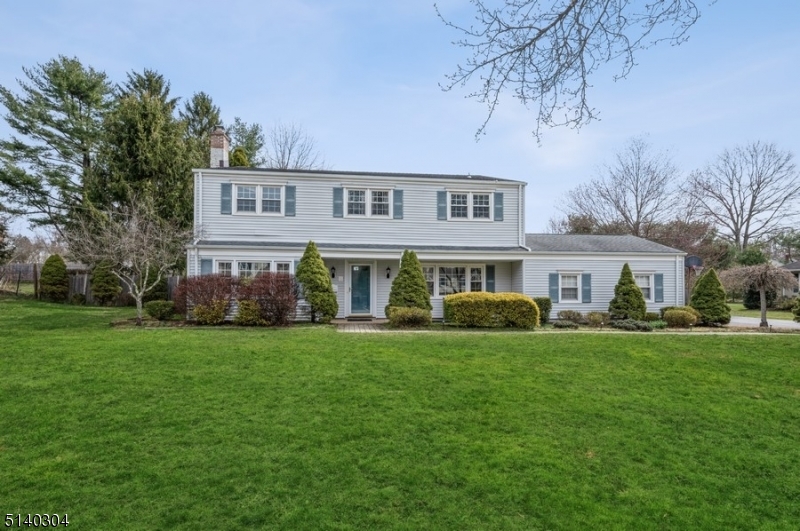 Casual elegance and peaceful privacy in a top location! Spacious and sun-filled Colonial Split Level home with 4 BD and 2 1/2BTHs is set on half an acre of beautifully landscaped property in Mendham. This impeccably maintained home offers generous living and entertaining spaces featuring gleaming hardwood floors, crown molding, abundant natural light, updated bathrooms, and tranquil views of the lush, green grounds.From the welcoming foyer, a comfortable family room flows to a large living room with a gas fireplace. The open layout continues to the formal dining area with sliding glass doors opening to an expansive deck overlooking the sprawling, fenced-in back yard. Enjoy preparing meals in the spacious and sunny eat-in kitchen appointed with granite counters, ample cabinetry, and a breakfast area next to another set of sliding glass doors to the massive deck. Off the kitchen is a handy laundry room, 1/2 BTH, and access to the attached 2-car garage.The second floor includes a lavish Primary BD suite complete with a sitting area, walk-in closet, and sumptuous en suite BTH with a double-sink vanity. There are 3 additional BDs, one with a walk-in closet, and a full hallway bathroom. The unfinished basement offers ample storage and it's equipped with a 22kw standby generator with a transferable warranty.Located in a scenic community in western Morris County, this home is close to Blue Ribbon schools, shops, eateries, and the Midtown Direct train in nearby Morristown.