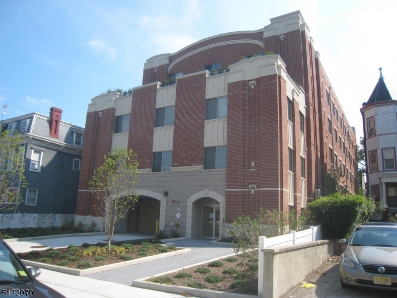 Spacious & Bright 2BR/2BTH Condo Located in the Mary Norton Manor Building. Rare & unique opportunity to live in one of the few units in this building which offers close to 1200 sf of living space spread out over two floors. Two generously sized bedrooms, two full baths, open floor plan with modern amenities, plenty of closet space, high ceilings & Central AC. Luxury living at it's finest with Hardwood Floors, Granite Counters, Stainless Steel Appliances & Designer Cabinets. Additional features include onsite Garage Parking(assigned), Laundry Facilities, Fitness Room & Elevator. Convenient location & within minutes to Manhattan, NJ Path & Bus.