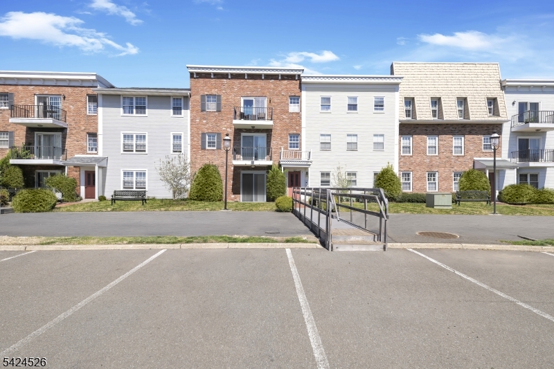Welcome to this beautifully maintained first-floor 1-bedroom, 1-bath condo in the heart of Clifton. This inviting home features a spacious bedroom and an open, functional layout, perfect for comfortable everyday living. Recently renovated just a few years ago, the unit offers modern finishes while maintaining a warm, welcoming feel. Enjoy the convenience of two assigned parking spaces, shared community laundry, and access to well-kept common and play areas. Ideally located for commuters with easy access to major highways, and just moments from Main Avenue offering a wide variety of restaurants, grocery stores, shopping, and everyday essentials right at your doorstep. Don't miss the opportunity to make this move-in ready condo your next home!
