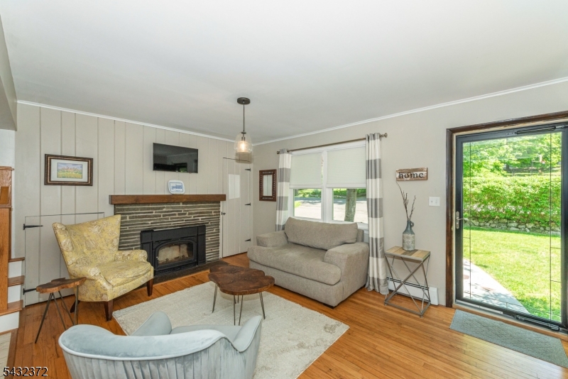 Welcome to 26 Lakeview Road, a beautifully maintained 3BR, 2-bath home on a quiet street in the highly desirable Lake Mohawk Country Club community. Offering the perfect blend of comfort, style, and lifestyle, this move-in-ready home features public water, natural gas, neutral d cor, and hardwood floors throughout.The inviting floor plan showcases a spacious living room highlighted by a cozy fireplace, creating the perfect gathering space. The updated eat-in kitchen impresses with handsome cabinetry, stainless steel appliances, recessed lighting, and a ceiling fan. Updated bathrooms and tasteful finishes reflect true pride of ownership. For additional living space, the beautiful family room features recessed lighting and hardwood floors.Step outside to a fabulous, level, fully fenced yard with a deck overlooking majestic landscapes perfect for relaxing, gardening, or entertaining.As a community member, you'll enjoy one of NJ's most sought-after lake lifestyles. The home is ideally situated mins from the Lake Mohawk Boardwalk, beaches, country club, boating, fishing, and dining, while remaining close to shopping and major commuting routes. Plus, Sparta's highly rated public schools consistently earn recognition for academic excellence.Offering the perfect combination of privacy, convenience, and an exceptional backyard setting, 26 Lakeview Road is a must-see home you do not want to miss!
