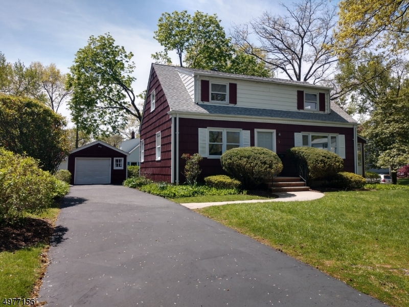 A classic cape on a corner lot of a lovely tree-lined street! New roof with 10 yr warranty. New hot water heater, stainless appliances, and vinyl plank flooring. You will appreciate the layout-- the main floor has a combined living and dining room, eat-in kitchen, 3-season porch, two bedrooms, full bath and extra washer/dryer. Upstairs are two bedrooms, second full bath and storage areas. Recently serviced natural gas heat and AC. Nicely landscaped yard and detached 1-car garage with extra space. Commuting options include convenient access to driving/bus routes, and just .5 mile to the NJ Transit train station and .3 mile to the McGinn school path. Great property and location for the price in award-winning Fanwood, with highly rated schools and a great town center. Floor is phthalate/formaldehyde free.