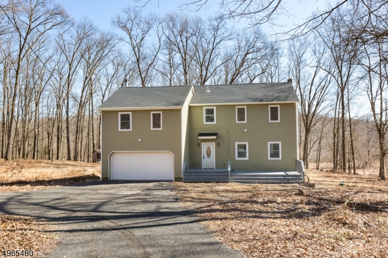 Fully Renovated spacious 3 Bedroom, 2.5 baths with 2 Car Garage Colonial on a 6 Acre private lot. Home boasts all brand new Electrical, Plumbing, Roof, Windows, High efficient Ductless Heating/Central Air Conditioning Units. Brand new cabinets, Quartz Countertops,Stainless-Steel Appliances,. Home features wood burning fireplace perfect for the cold winter nights. All you have to do is move right in!