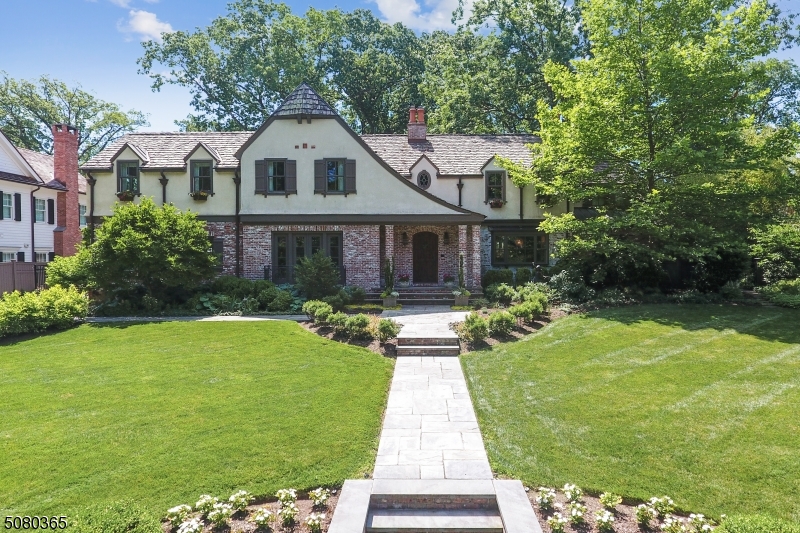 Absolutely stunning, completely renovated 5 BR, 5.1 BA custom Colonial, sought-after "Circle of Friends" neighborhood. Exceptional, staycation property. A home fitted w/every indoor & outdoor amenity! LR w/FP, spacious DR, must have tucked away 1st flr Study w/FP.  Gourmet high-end Kitchen & Break. Rm open to Fam Rm overlooking spectacular backyard. 5BRs on 2nd.  Super LUX Mast. Suite w/private deck, huge WIC & spa-like bath w/steam shower. Fin LL w/rec rm, OFC/Exer. space, craft studio, FB w/steam shower, LDRY Rm. Backyard must be seen to appreciate: expansive patio, pergola covered dining area, custom gas/log fireplace w/built-in seating, water feature, custom lighting, pebble pathways & home herb/veggie garden! Heated 2 car att. gar., convenient Mudroom, generator....the amenities of this home are endless!