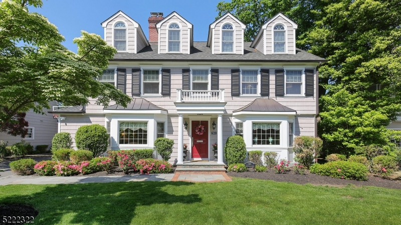 Welcome home to this Gorgeous Center Hall Colonial on QUIET TREE LINED STREET in the heart of WYCHWOOD!  This stunning 6 bedroom, 3.1/2 bath home has been impeccably renovated with a modern open floor plan.  An inviting foyer is flanked by a formal dining room and a sun filled Living Room w/custom bookcases and Fpl. The Chef's Kit with high end stainless steel appliances, Wolf gas range, new Kit Aid DW, Sharp MWO, custom cabinets & granite countertops.  A large center island  opens to a step down dining area with double sliding glass doors  and a spacious Family Room with a wood burning Fireplace. The second floor has an airy upper hallway. The spacious  Primary bedroom includes custom built in's by the Closet factory & remodeled bath  (2017) There are three more large Br's and an updated hall Bath.  The third floor boasts two additional Br's and bath, plus storage. Laundry Rm 2nd fl renovated (2017) w/LG electric front loading washer & dryer, 3 zone CAC, are some recent updates. The professionally landscaped property features a bluestone patio & entryway. The side yard was regraded w/new drains to the street plus  new window wells.  Don't miss this wonderful home in a sought after premier neighborhood  It is only a block away from Wilson elementary school, the town Library, downtown shopping, NYC transportation