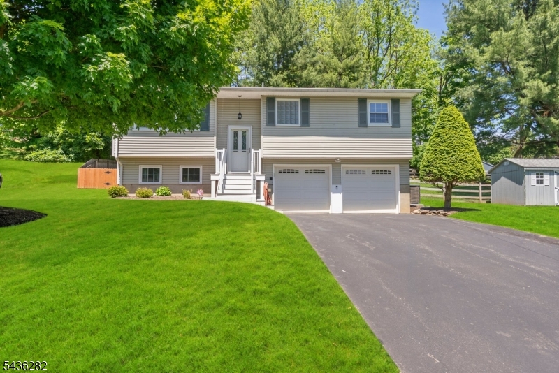 Welcome to 34 Beavers Street in the charming Borough of High Bridge!  This beautifully maintained bi-level home offers 3 bedrooms, 1.5 baths, ana approximately over 1500 sq feet of comfortable living space. Situated on an oversized double lot spanning nearly0.4 acres, this property provides the perfect blend of indoor comfort and outdoor enjoyment. The kitchen features granite counter tops, and ample cabinet space, Hardwood flooring flows throughout much of the main level. The finished lower level offers additional living space ideal for a family room, home office, gym, or recreation area. Roof, central air. water heater and furnace all 3 years old! Outside, enjoy a fenced in yard, storage shed, and plenty of room for entertaining, gardening, or future possibilities. Conveniently located near parks, schools, restaurants, and commuter routed, Walking distance to direct train to Newark Penn Station and Main Street. this home offers small-town charm with easy access to everything Hunterdon County has to offer. A rare opportunity to own a property with space, updates, and potential in one of New Jersey's most picturesque communities.