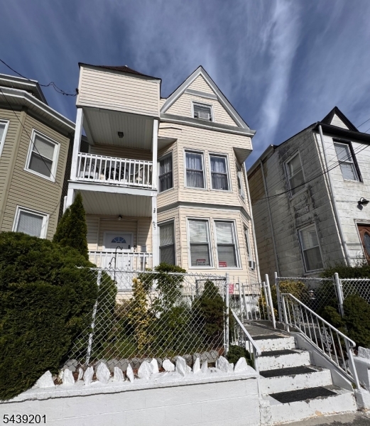 Excellent opportunity to own a spacious two family home offering flexibility, comfort and income potential! The first floor unit features a living room, a large eat-in kitchen and 2 bedrooms. The second and third floors are combined offering a spacious living room, a formal dining room, large eat-in kitchen, 3 bedrooms and a family room that can easily be converted into a 4th bedroom. A finished basement provides extra space for recreation or storage. A great opportunity for an owner-occupant seeking rental income or an investor looking for an income producing property. Conveniently located near schools, shopping, parks, public transportation and major highways.