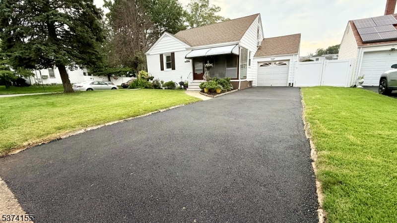 Welcome to this beautifully maintained 4-bedroom, 2-bath Cape Cod in the heart of Sunnyside! With excellent curb appeal and a welcoming front porch, this home offers comfort, functionality, and space inside and out. Step into a cozy living room that leads to a hallway with two main-level bedrooms and a full bathroom. A formal dining room and bright eat-in kitchen make everyday living and entertaining a breeze.Upstairs, you'll find two additional sunlit bedrooms, guests, or flex space. The semi-finished basement adds valuable living space along with a second full bathroom, ideal for a recreation area, home gym, or guest suite. In the back of the home, you'll find a dedicated office space perfect for remote work, hobbies, or extra storage. The nicely maintained yard features a patio area great for outdoor relaxation or entertaining. A one-car garage and additional driveway parking add convenience.