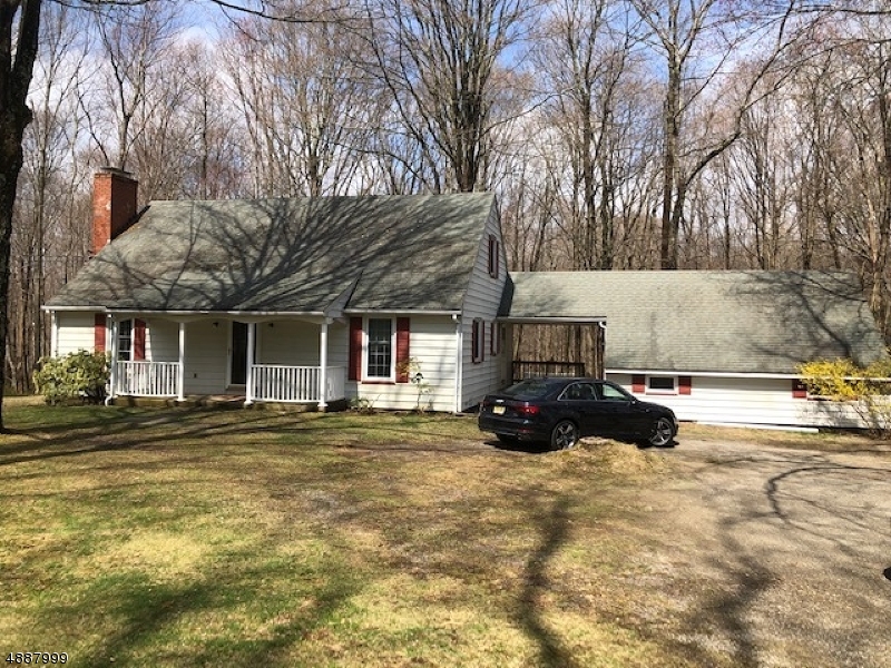 OVER 18 ACRES!!!!  Possibilities are unlimited.  Expanded cape with 3 total Buildable lots .. (Request preliminary engineering report and soil logs from agent).  House nicely situated away from road.  House needs updating so bring your imagination!  Come see for yourself the beautiful wooded landscape.