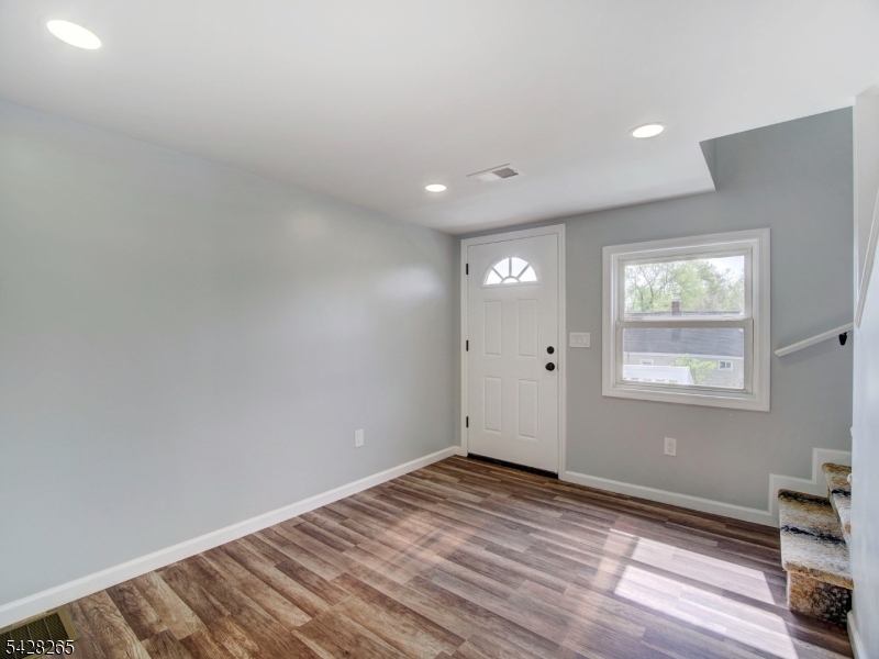 Beautifully updated single-family home located at 4 Emmans Road in Roxbury! This 6-room home features 3 spacious bedrooms and 2 full bathrooms, including a primary suite with a private bath and walk-in closet. Move-in ready and freshly renovated , this home offers both comfort and functionality for today's lifestyle.Ideally situated just minutes from Route 46 and major transportation options, making commuting a breeze. Conveniently located near shopping centers and adjacent to a state park, offering easy access to outdoor recreation. The home offers modern upgrades throughout, including stainless steel appliances, new electric, a new furnace, and a new water heater with forced hot air heating. Durable and stylish vinyl flooring runs throughout the home, adding a clean and contemporary feel. The finished basement provides additional living space, perfect for a recreation room, home office, or gym