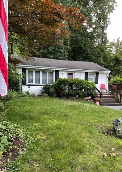 BOM Priced to reflect any upgrades that may be warranted, AS IS, No repairs by Seller. Sit quietly on your large front porch and enjoy Nature or Cozy up the the Beautiful Stone Fireplace.  Great Lake Community with Clubhouse, Membership is Mandatory, but this Lake Community will not disappoint. A one time New Member Fee of $500 is due at closing. Details to be provided upon request. Natural Gas Budget for Heat and Range less than $125. Scenic Media Room or Playroom with Picture Window overlooks the Rear Yard.  Beautiful 58" X 28" Garden Window in newer remodeled Kitchen.  Pull down attic stairs for storage.  Generous Bedroom sizes, a little piece of Heaven.