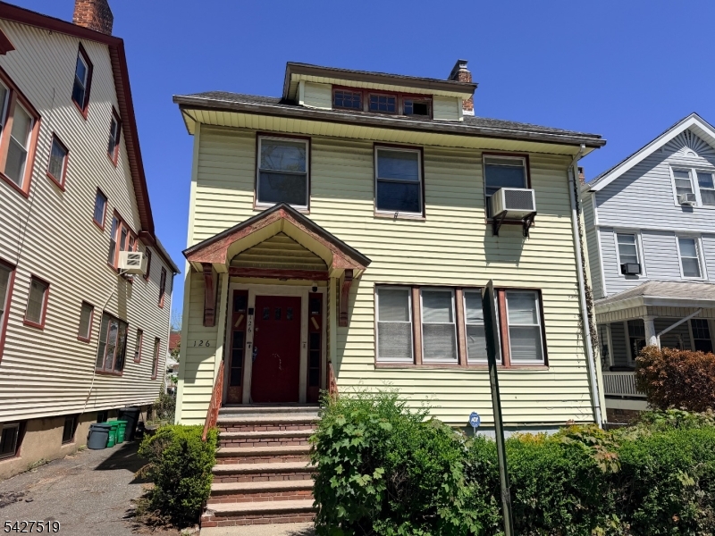 Exceptional 2-family investment opportunity in East Orange with strong income and value-add potential. The first-floor unit features 2 bedrooms, 1 full bath, and beautiful hardwood flooring throughout, with the flexibility to easily convert into a 3-bedroom layout. The second unit spans the 2nd and 3rd floors, currently configured as a spacious 4 bedroom, 1 bath, 1 office with the potential to expand into a 5 bedroom unit ideal for maximizing rental income. Additional highlights include a full unfinished basement with an existing bathroom, offering further expansion possibilities. Separate utilities provide convenience for both owner-occupants and investors. The property also features a private backyard and an extended driveway for ample off-street parking. Conveniently located near transportation, shopping, and schools, this property is perfectly positioned for both commuters and tenants. Whether you're looking to live in one unit and rent the other or fully capitalize on its income potential, this is a rare opportunity with significant upside.